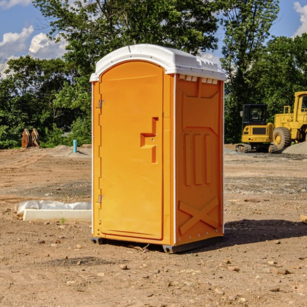 how often are the portable restrooms cleaned and serviced during a rental period in Dover